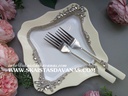 Tortes šķīvis un dakšiņas